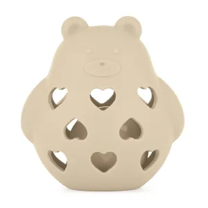 PETITE&MARS Hračka silikónová s hrkálkou Bear Basil Desert Sand 0m+