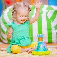 BRIGHT STARTS Hračka hudobná svietiaca Press&Glow Spinner 6m+