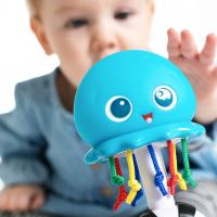 BABY EINSTEIN Hračka hudobná a svetelná Ocean Glow Sensory Shaker™ 0m+