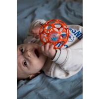 OBALL Hračka Oball RATTLE 10 cm 0m+ orange + 50 ml Aquaint